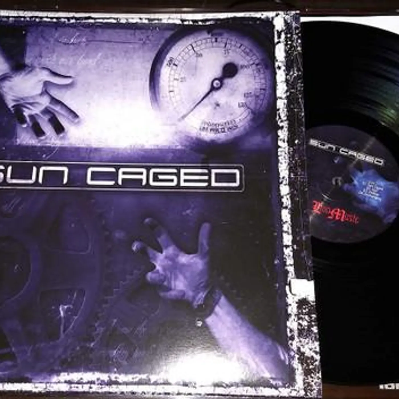 SUN CAGED Vinyl Record