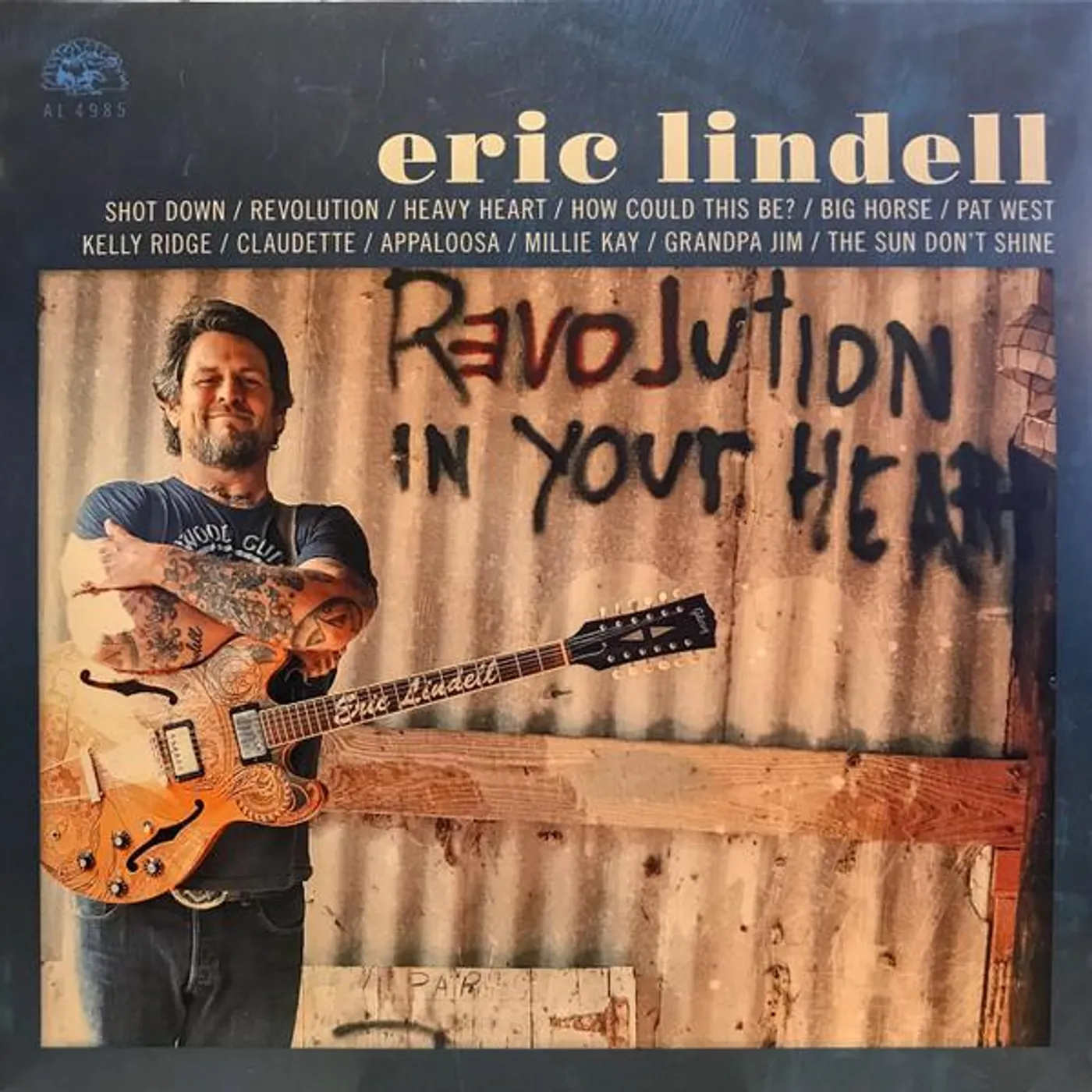 Eric Lindell REVOLUTION IN YOUR HEART (Orange) Vinyl Record