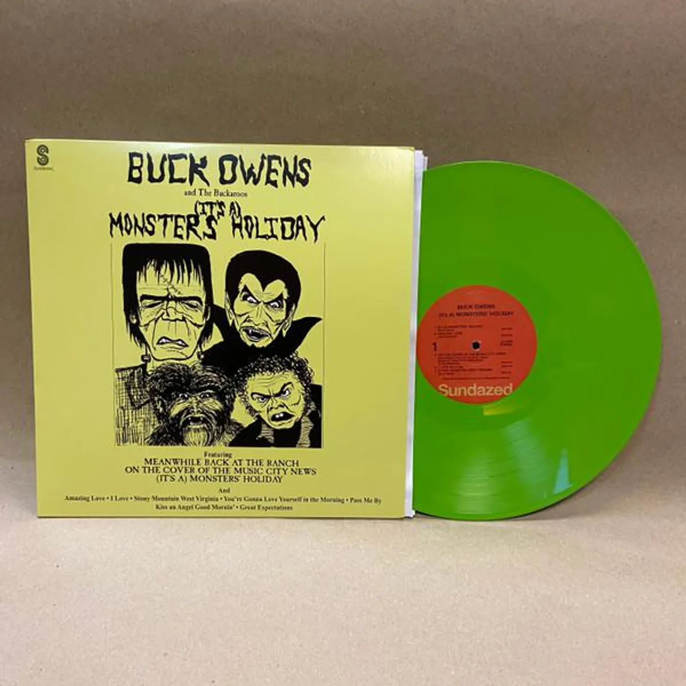 Buck Owens And His Buckaroos (IT'S A) MONSTERS' HOLIDAY (GREEN VINYL) Vinyl Record