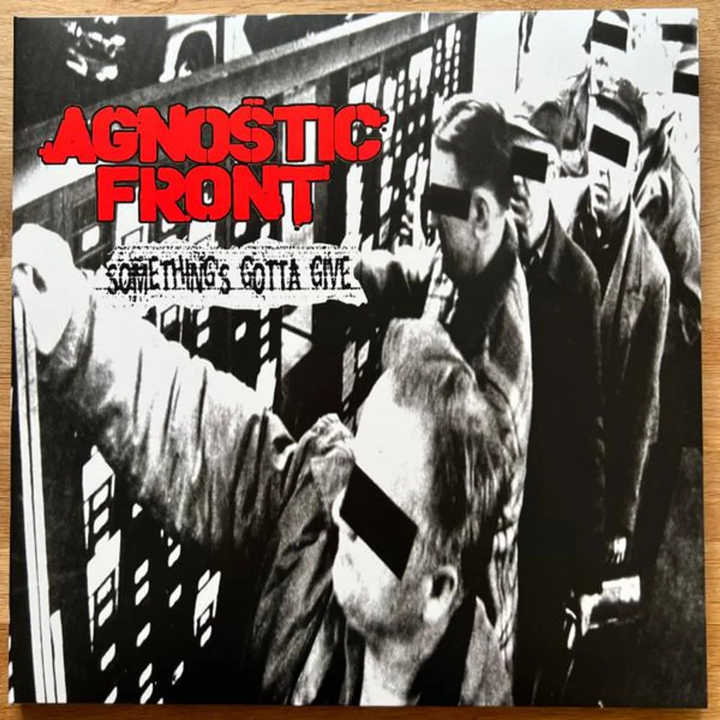 Agnostic Front SOMETHING’S GOTTA GIVE (LTD/180G/CLEAR W/ RED & SILVER VINYL) Vinyl Record
