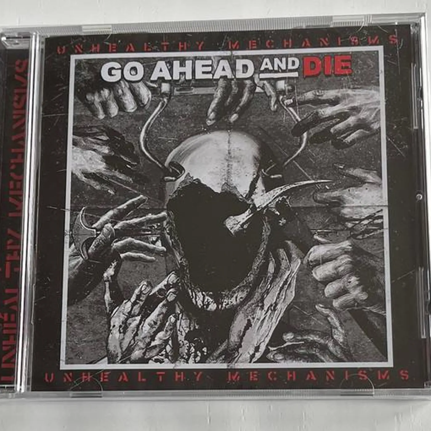 Go Ahead And Die UNHEALTHY MECHANISMS CD