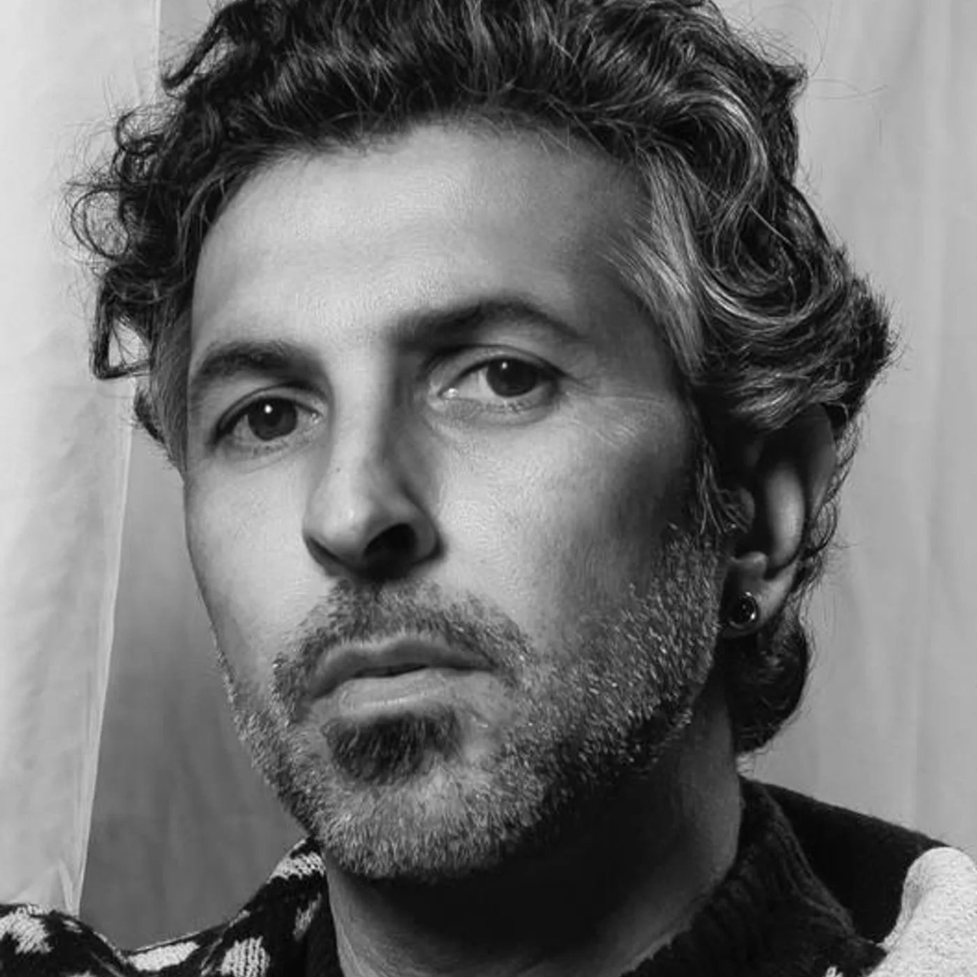 Arcángel Brand Page