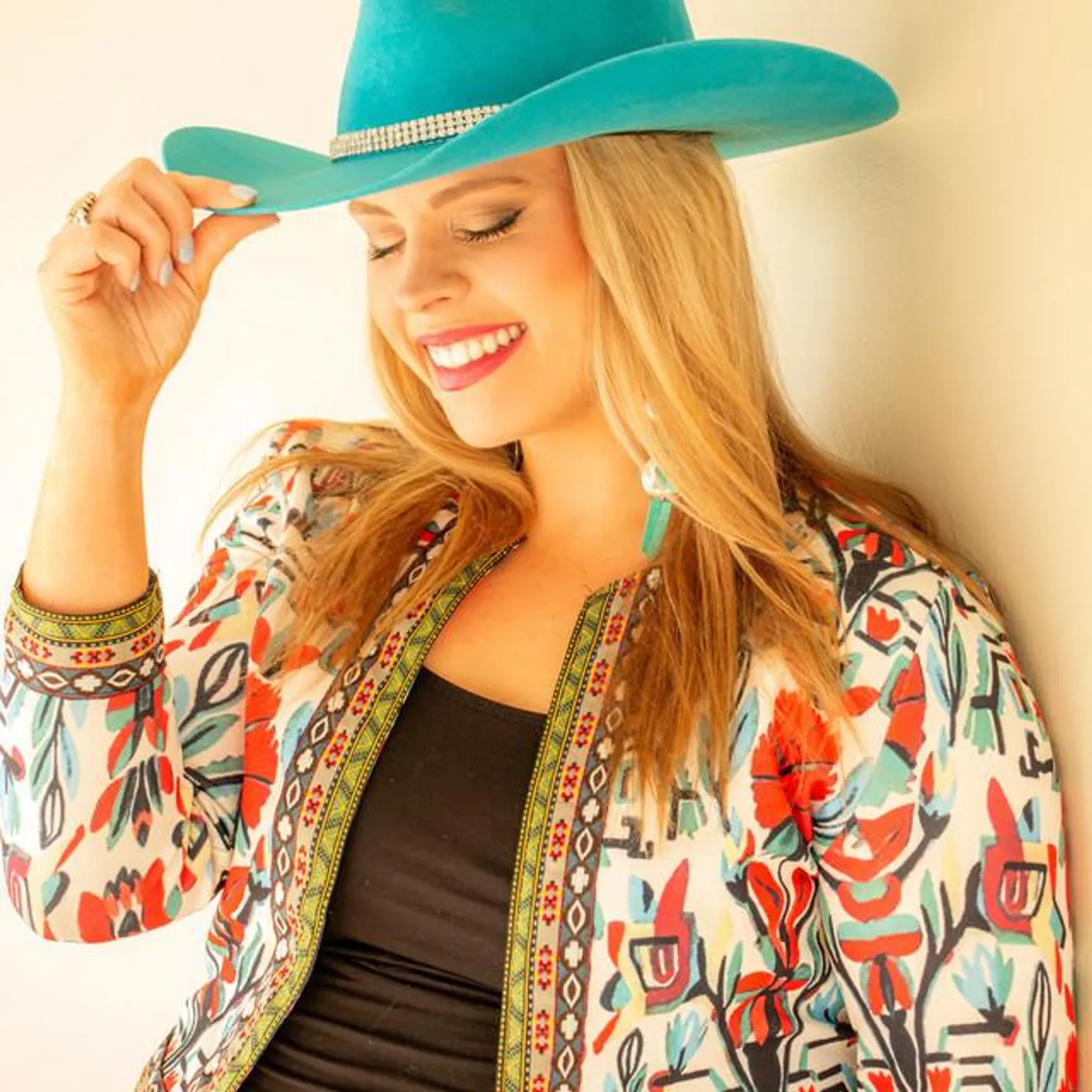 Holly Tucker Brand Page