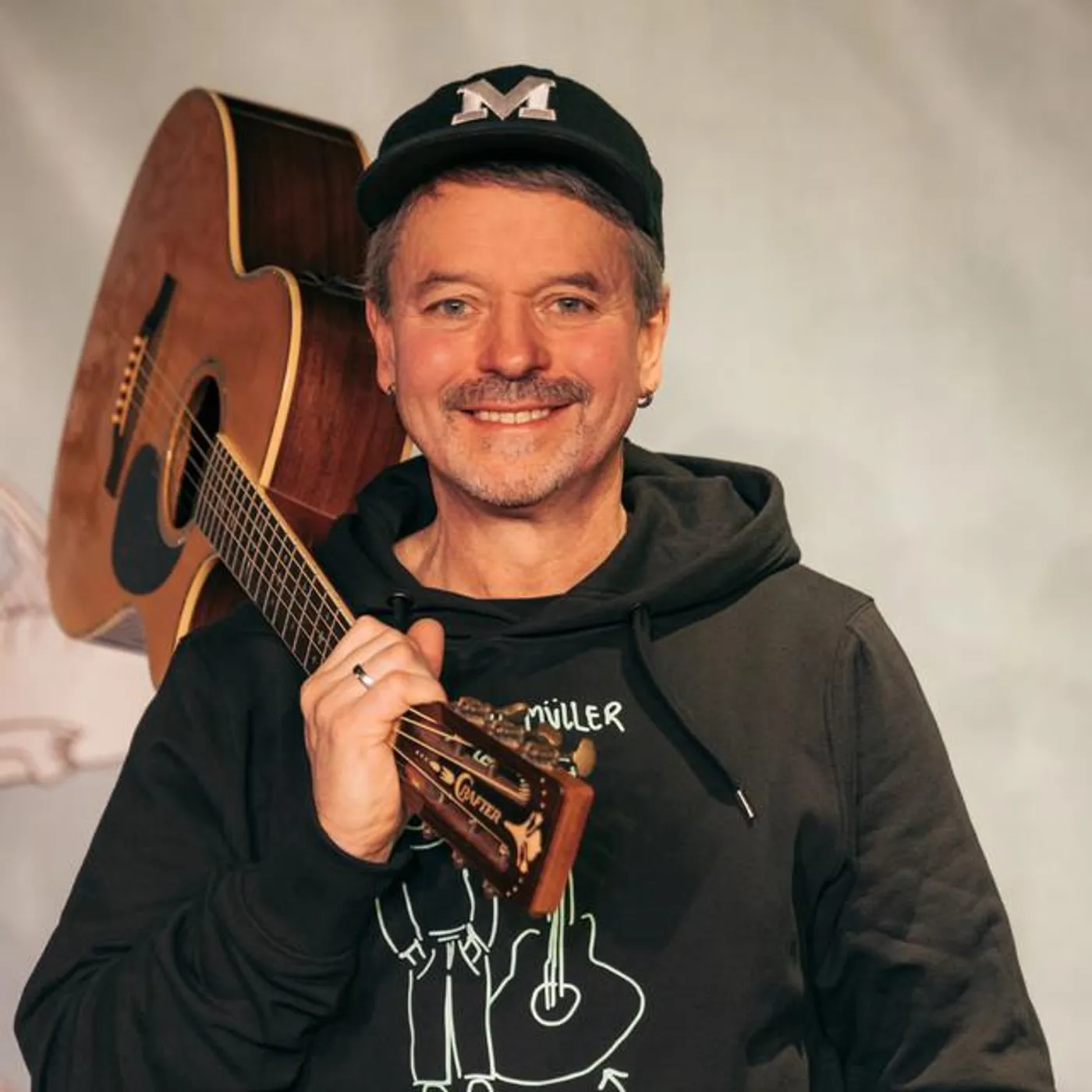 Herr Müller und seine Gitarre