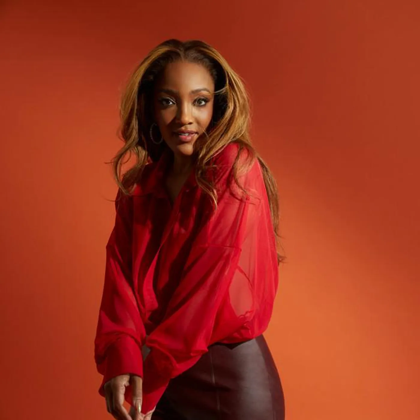 Mickey Guyton Brand Page