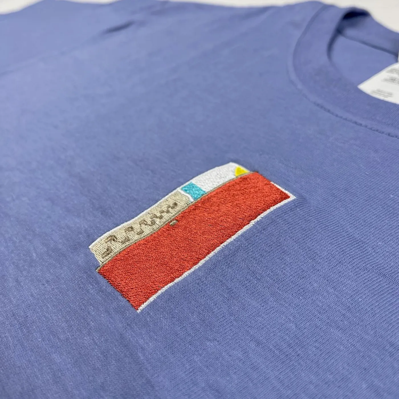 Surfaces Door Tee