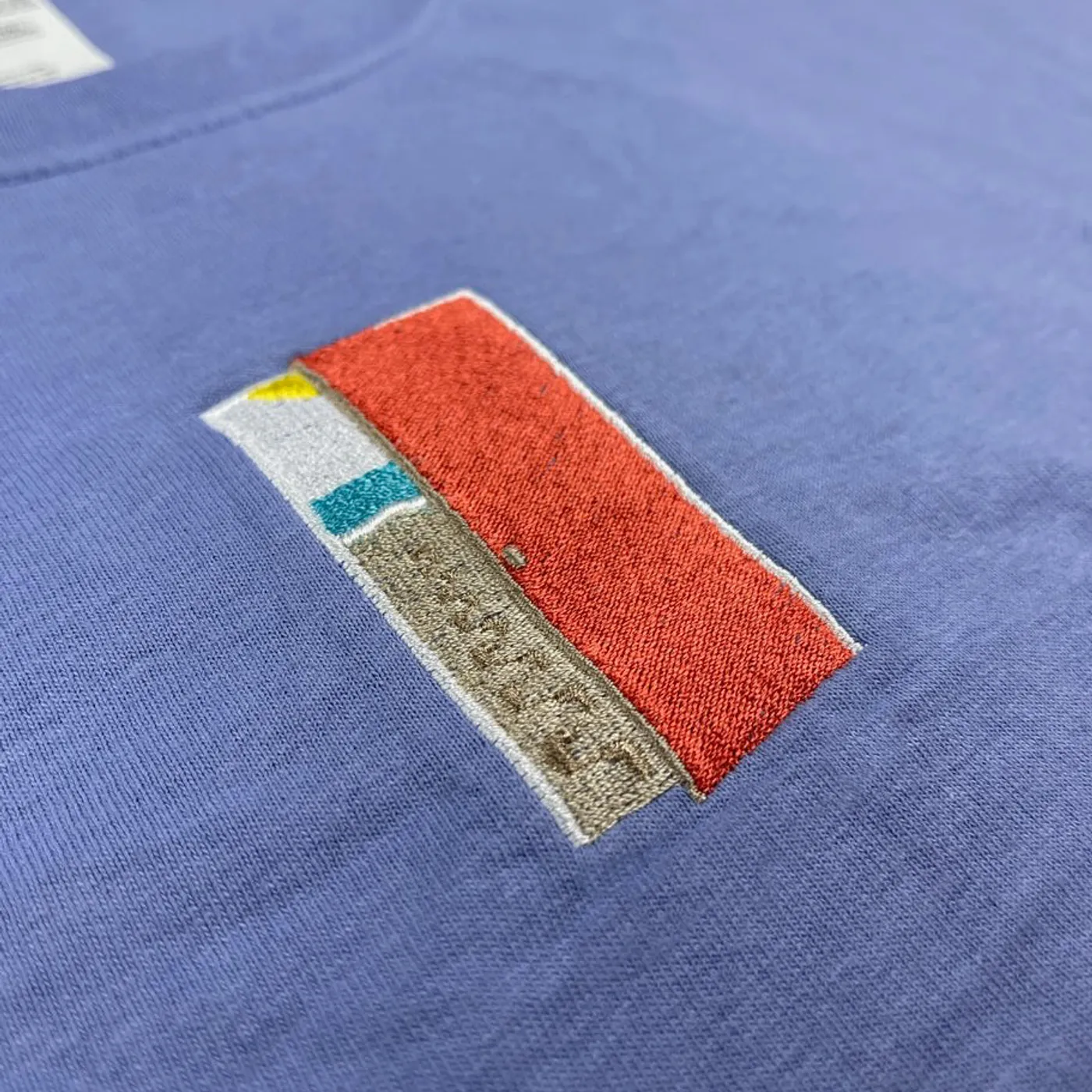 Surfaces Door Tee