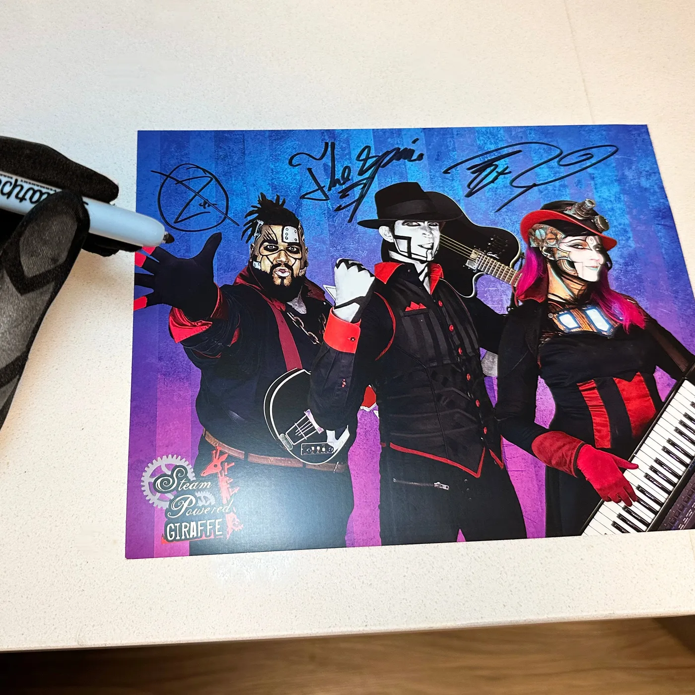 Steam Powered Giraffe Autographed Group Photo (8.5'' x 11'')