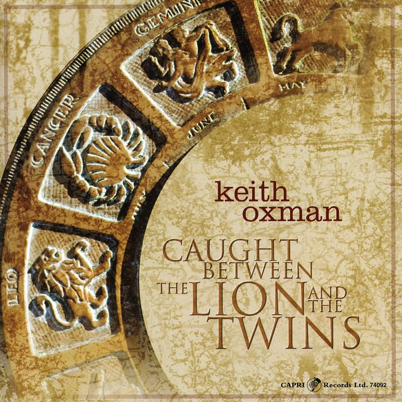 Keith Oxman CAUGHT BETWEEN THE LION & THE TWINS CD
